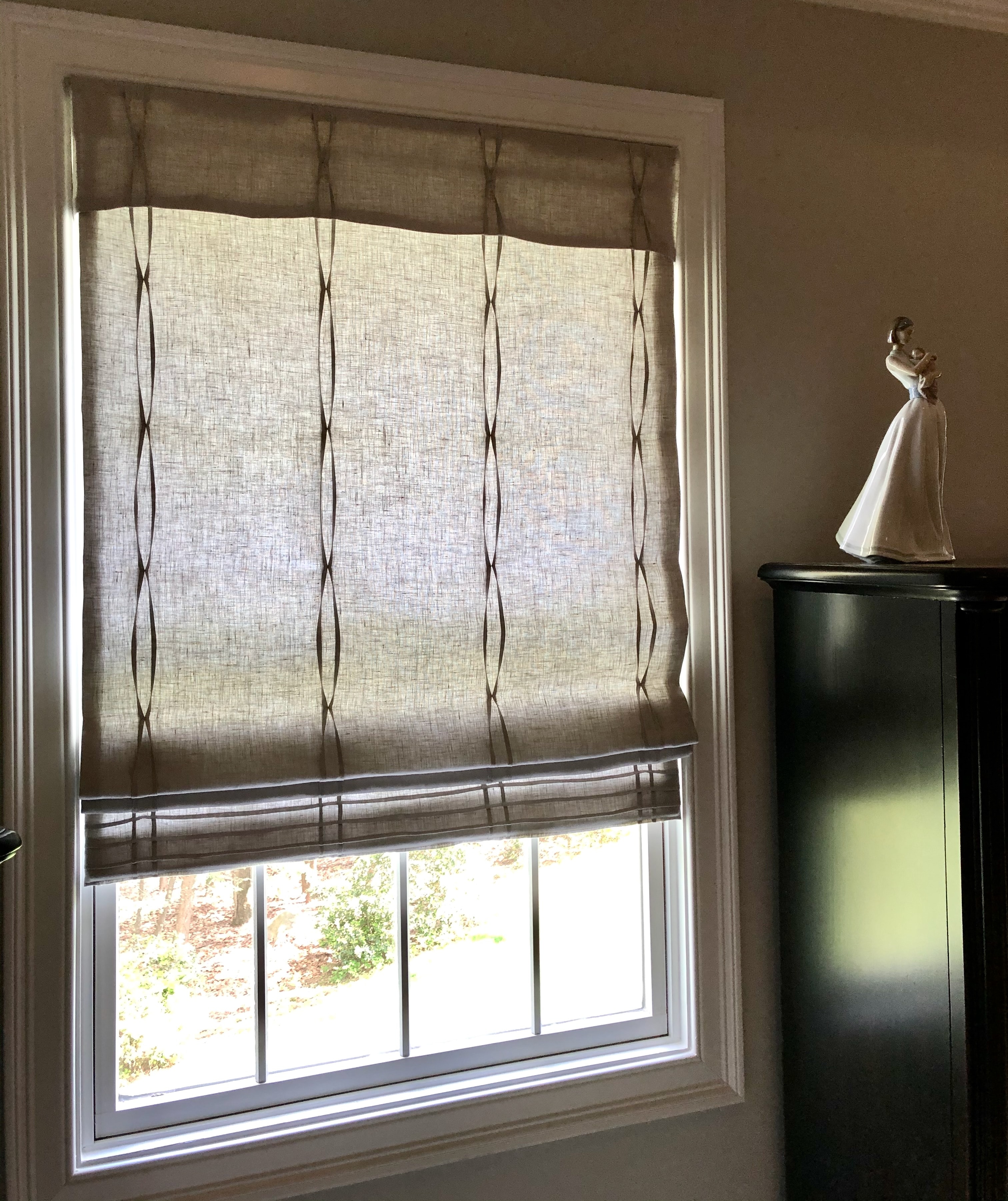 Close-up of vertical tuck linen shade detail