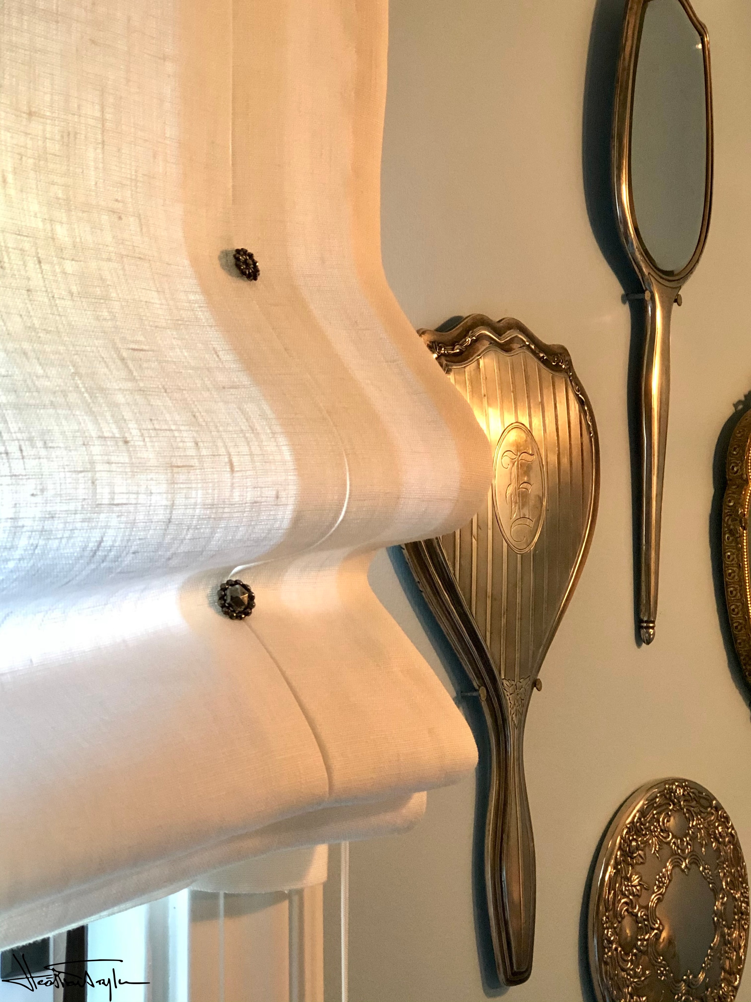 Pleated linen shade with vintage steel buttons