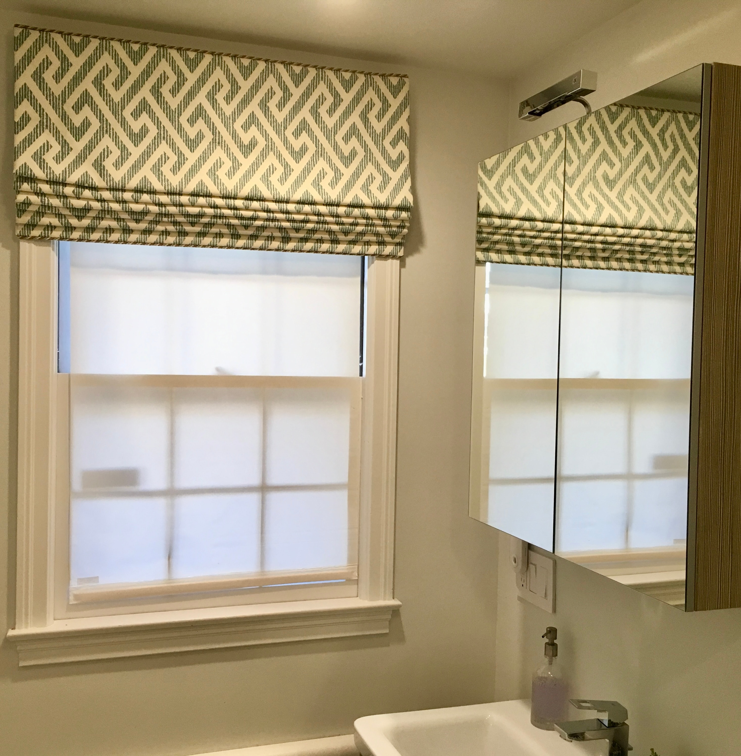 Greek key pattern matched on folds of Roman shade